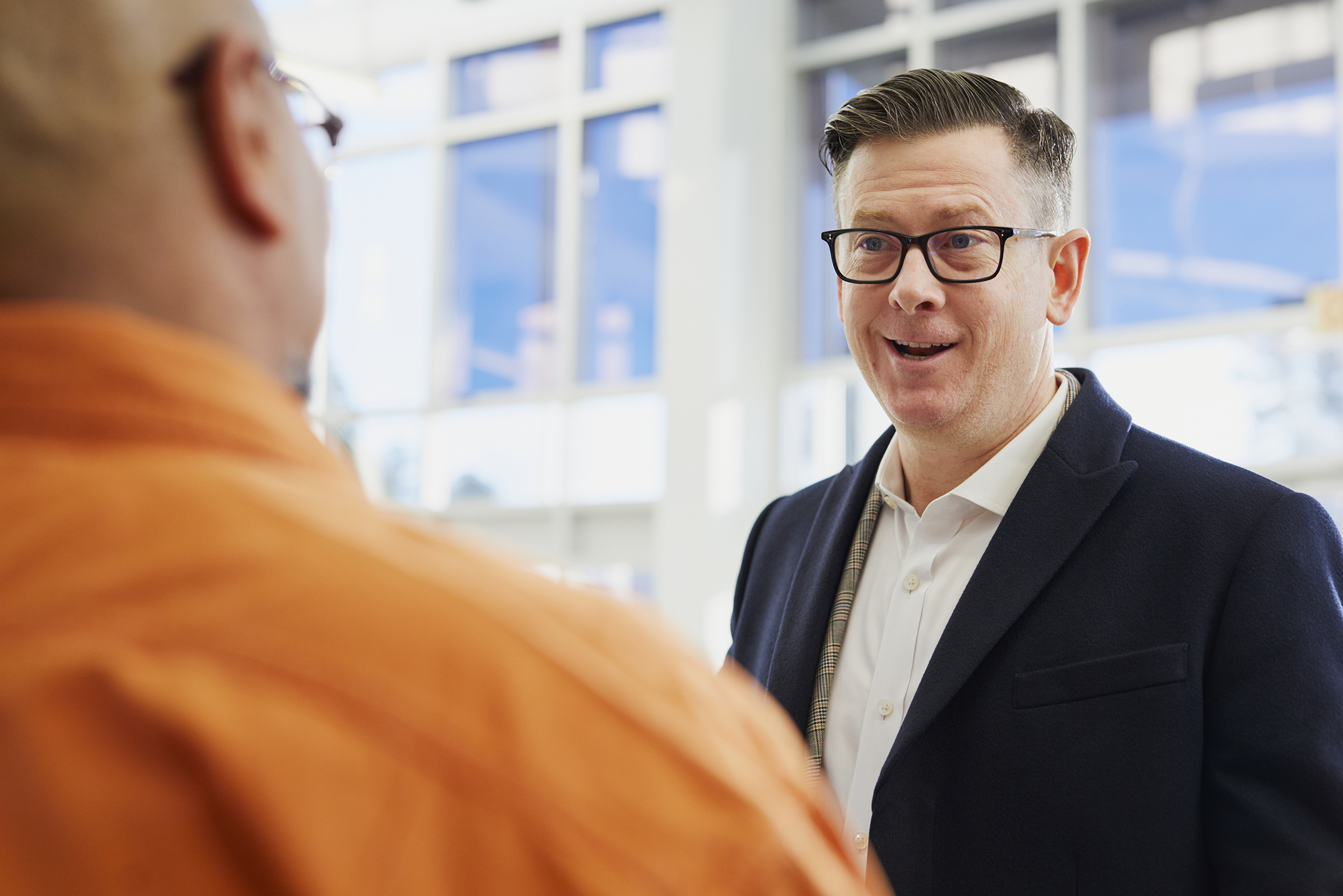 Canva - Two Men Talking on Focus Photography small